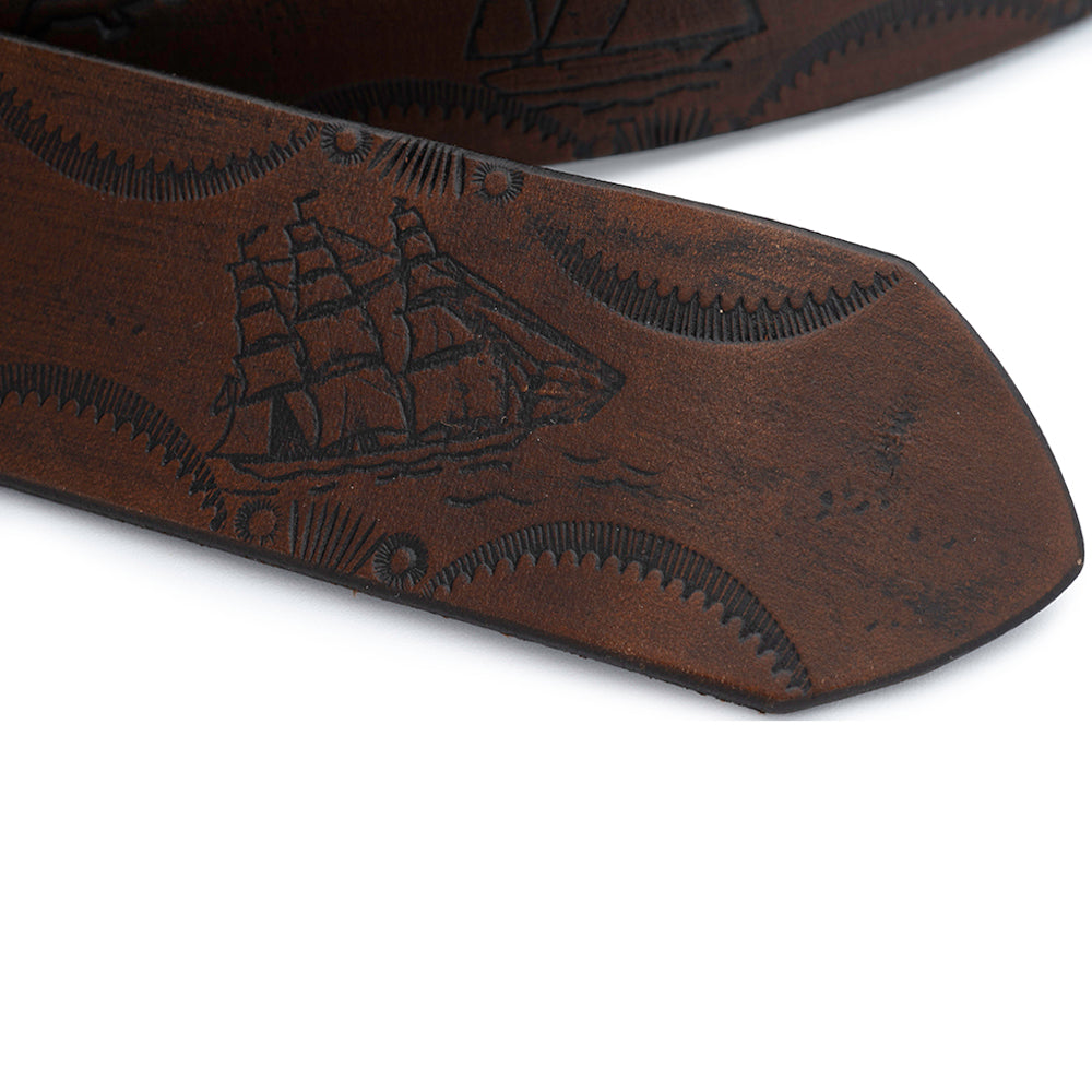 detail of hand stamped leather belt