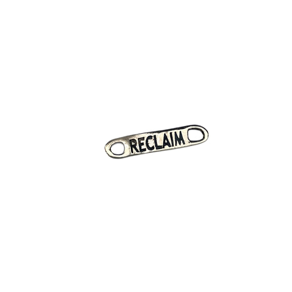gold link with 'RECLAIM' engraved on a white background