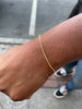 model shot of twisted sister 14K singapore style chain on wrist