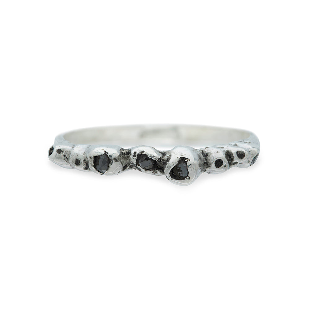 silver barnacle band with black diamonds on a white background
