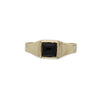 gold ring with square black whitby jet stone on white background