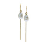 keishi pearls on gold chain earrings with white background