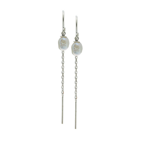 Pair of keishi pearls on silver earrings with chain drops on a white background