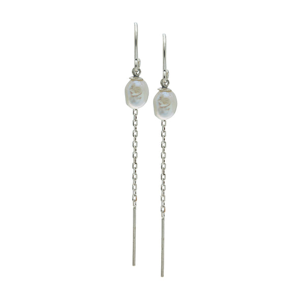 Pair of keishi pearls on silver earrings with chain drops on a white background