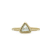 Gold ring with a triangle-shaped macle diamond on a white background