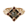 gold poisin ring with lions holding a jeweled center cluster that is a little box