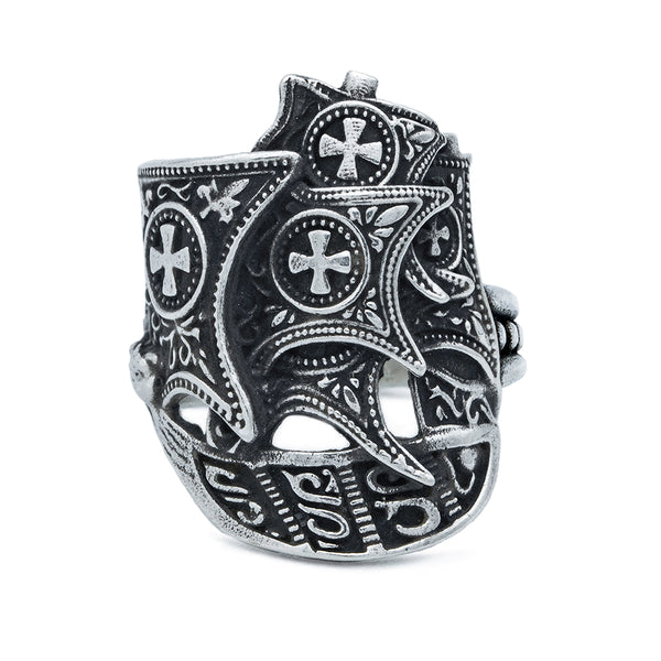 Top of silver ring featuring intricately detailed Spanish galleon ship with cross motifs