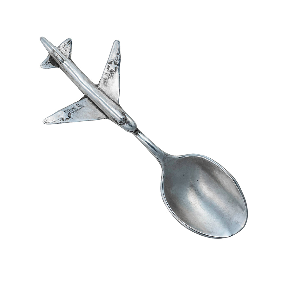 A silver spoon with airplane handle.