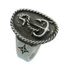 Silver ring with anchor design on a white background