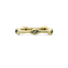 gold band ring with bone detail set with diamonds in between