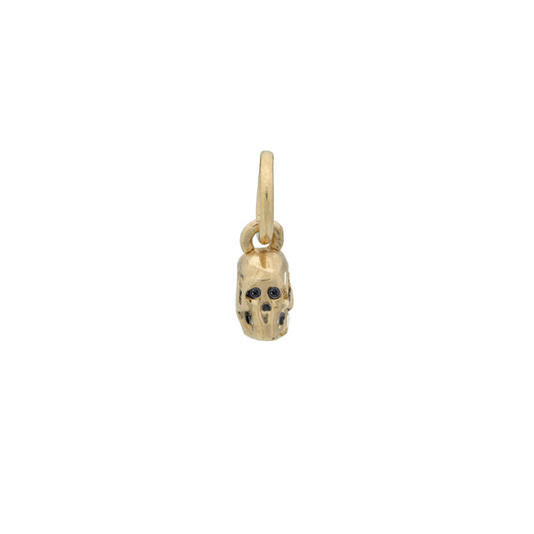 Tiny Skelly charm in Gold