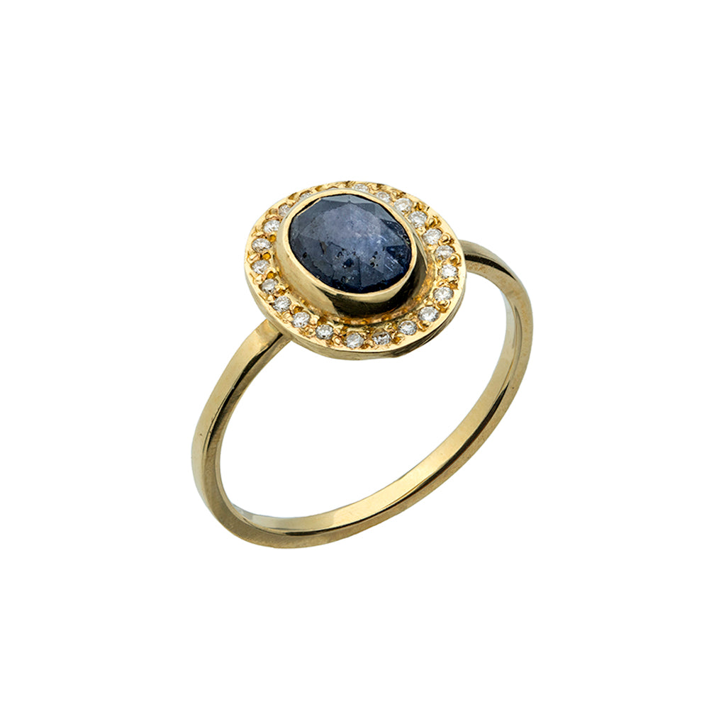 rose cut sapphire surrounded by a halo of small diamonds set in 18K yellow gold