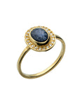 rose cut sapphire surrounded by a halo of small diamonds set in 18K yellow gold