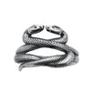 intertwined serpents in silver with black diamond eyes on a white background