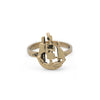 A gold ring featuring a sculpted sailing ship atop the band.