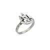 Side view of a  silver ring featuring a sculpted sailing ship atop the band.