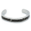 A half inch silver cuff with blackened detail from shark vertebrae.
