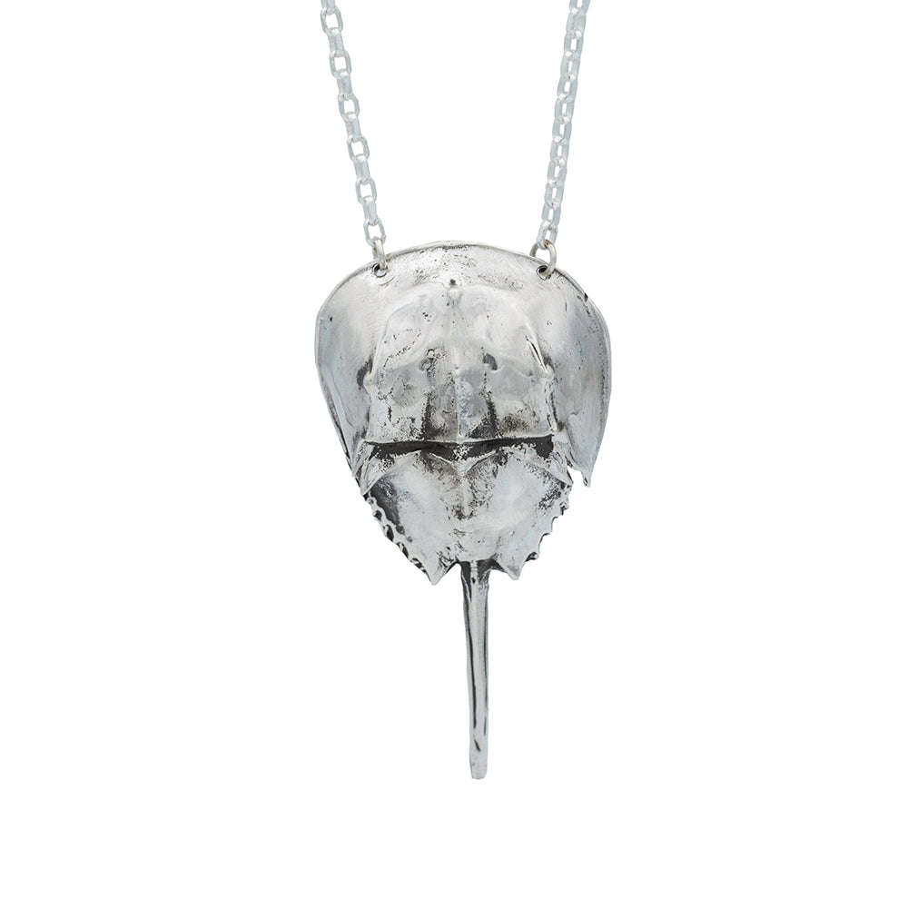 large silver horse shoe crab pendant on silver chain