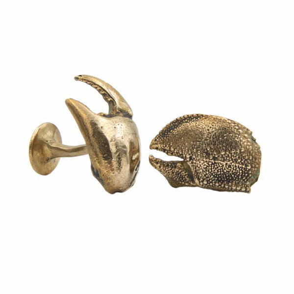 Pair of bronze mismatched crab claw cufflinks, one is smooth and one is textured.