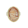 An oval shaped gold ring holding modern cameo with ship carved in cornelian shell.