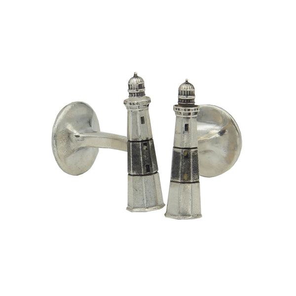 A pair of silver cufflinks with small lighthouse with antiqued black stripe.