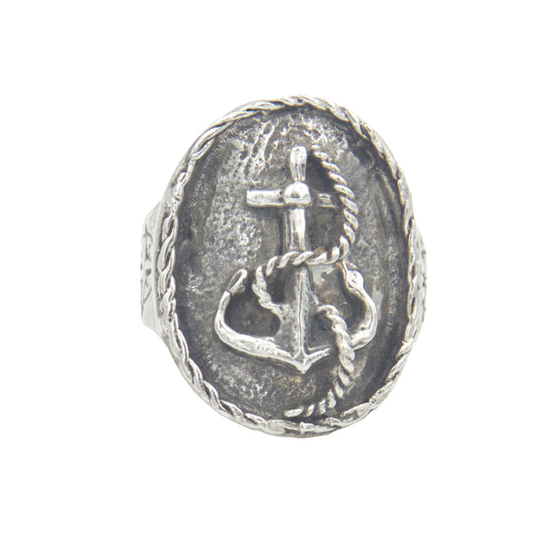 An oval silver ring with an anchor and rope detail.
