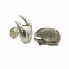 A pair of silver cufflinks that are two different lobster claws.  One is a smooth left claw and one is textured.