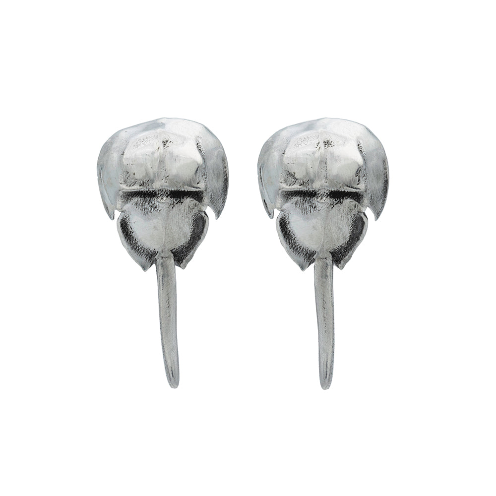 A pair of silver horse shoe crab stud earring
