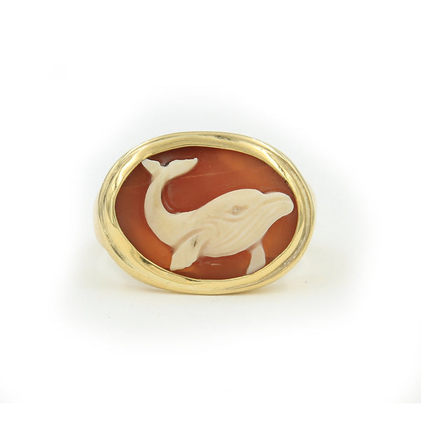 gold cameo ring holding whale carved into cameo shell stone