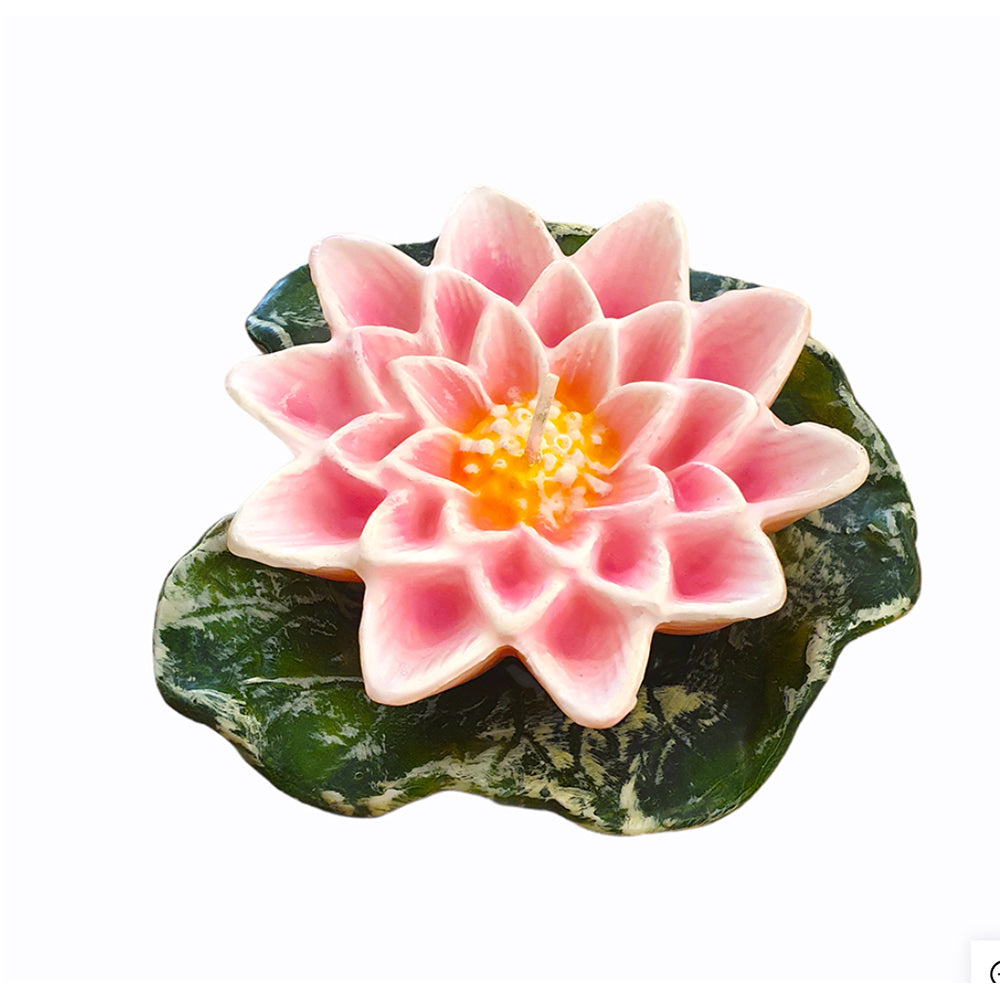 floating pink water lily paraffin candle